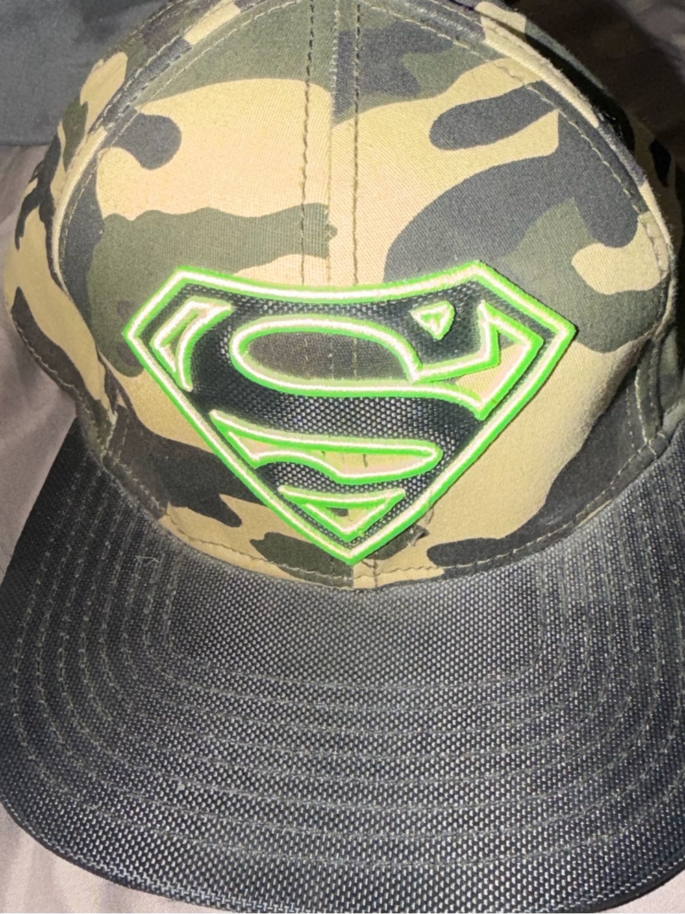 Camouflage Snapback Cap with Neon Green Superman Emblem